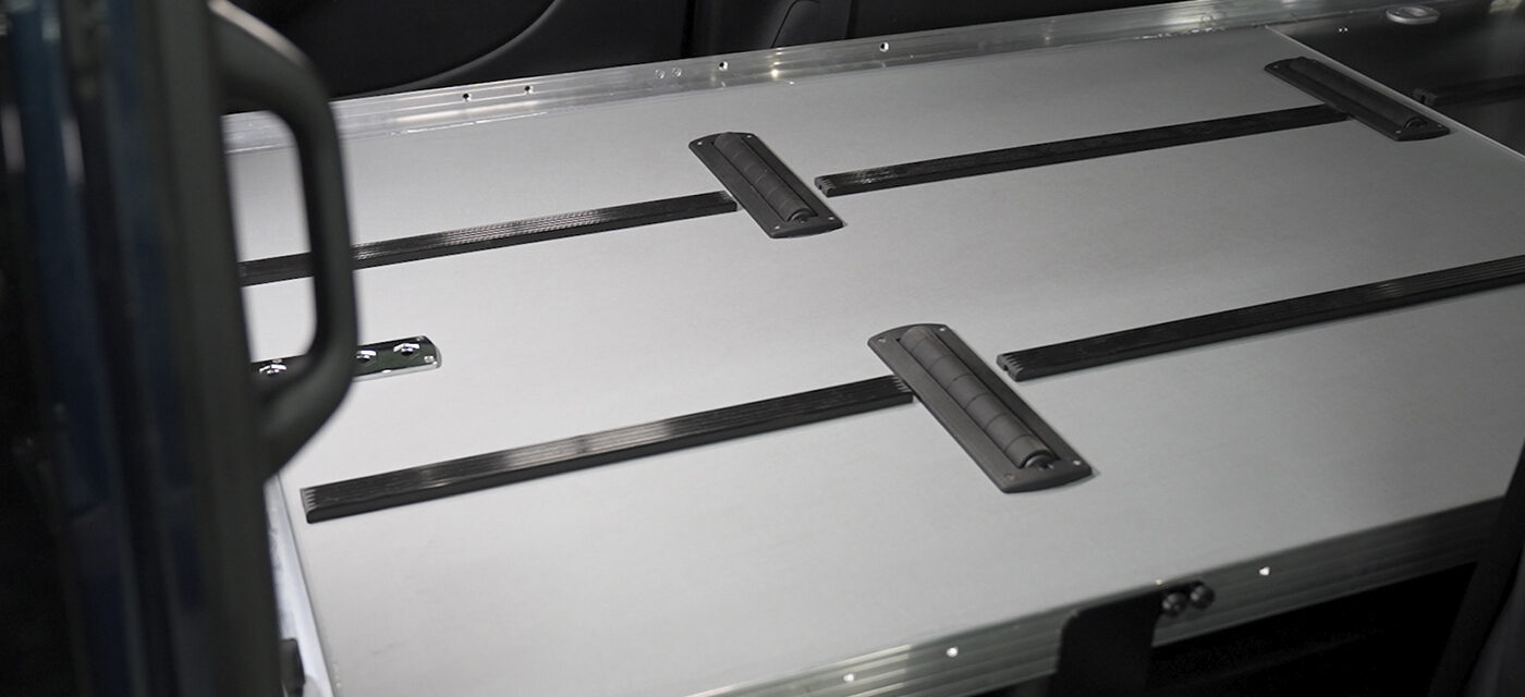 The deck of a SS150XL single deck, highlighting its rollers, glide strips, and sealed surface