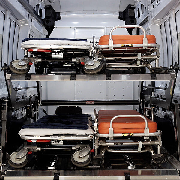 Oversized cot side-by-side with standard cot on each level of the DD2000-XLC