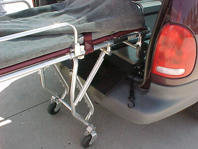 Loading a cot onto the SS150 Single Deck