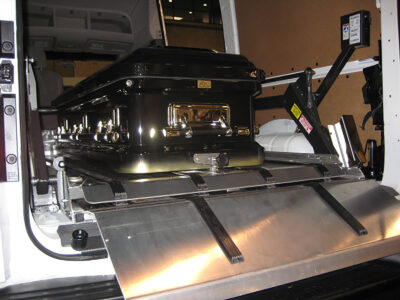 DD2000-XLC top deck lowered with casket loaded