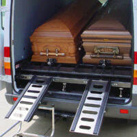 DD4000 with 2 caskets secured on tilted down upper deck